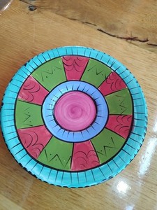 Hand-painted piece Saucer from Penzo of Zimbabwe 1998 