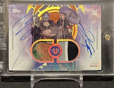 2025 Topps WWE Universe Asuka/Kairi Saine Tag Team Relic Auto Orange Warp 02/25 