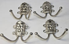 4 haczyki na płaszcze głowa lwa wytłaczane haczyki wykonane z okrągłego materiału zakrzywione niklowane
