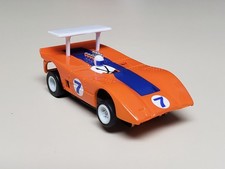 Auto World XTraction Can Am Racer Orange Blue 7 Slot Car Great Condition