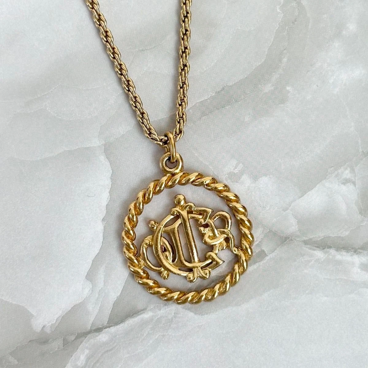 Orecchini merce Christian Dior collana emblema cerchio tondo GP placcato oro donna