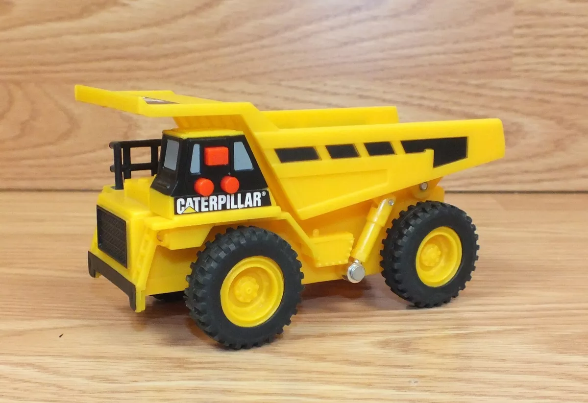 Toy state top dump truck