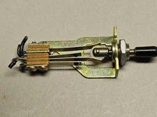 Switchcraft SPDT spring return to center open frame toggle switch