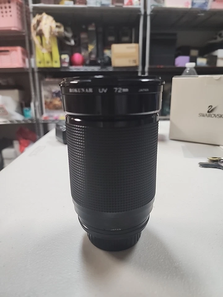 LENTE ROKUNAR ZOOM AUTOMÁTICO MACRO 28-200mm 1:3.8 - 5.6 Minolta MD M8770842 Foto 2 de 4