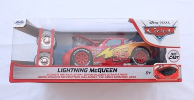 New OPEN BOX Disney Pixar Cars Jada Lightning McQueen Tire Rack Edition