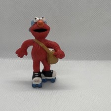 Sesame Street Elmo Plastic Figurine with Bag & Roller Skates