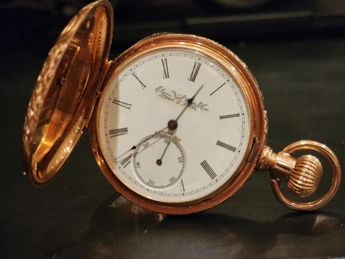 Antique Elgin National Watch Co. pocket watch housed in a solid 14K gold case.
