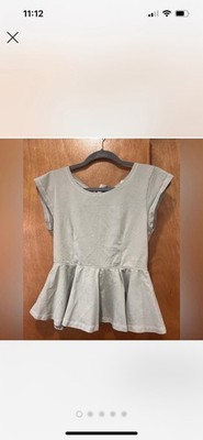 NWT HEM AND THREAD PEPLUM OPEN BACK TOP