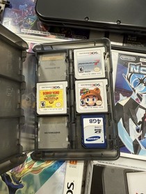 Nintendo New 3DS XL System Black Bundle (Majora&rsquo;s Mask, Pok&eacute;mon Diamond, plus)