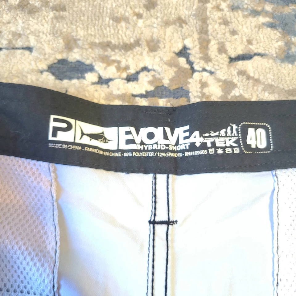 Pantalones cortos de pesca al aire libre Pelagic Hybrid Evovle 4 Tek para hombre talla 40 Foto 3 de 4