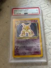 2000 POKEMON BASE SET 2 #1 ALAKAZAM-HOLO PSA 7