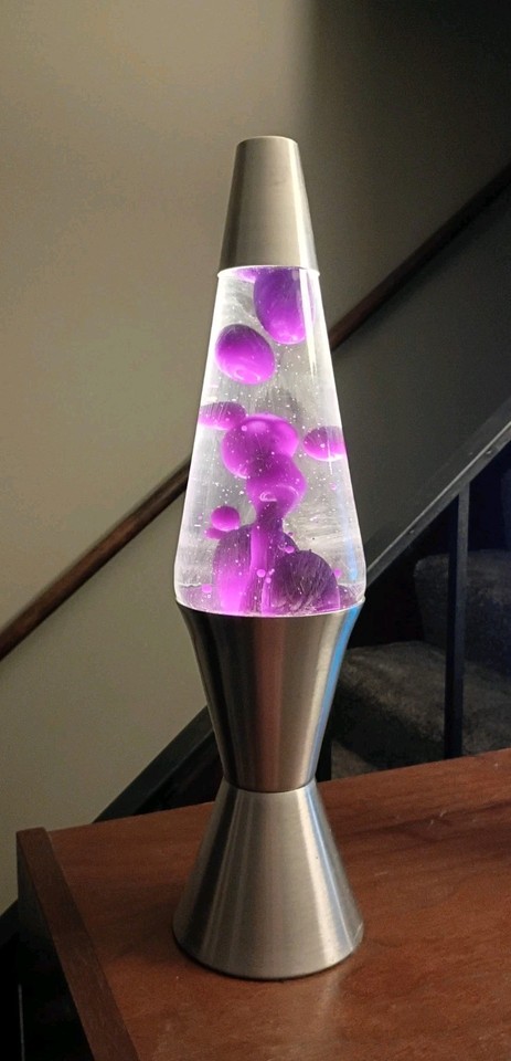 A complete, working 90s Lava Lite in purple wax — the OG brand, full size, with all original parts intact.