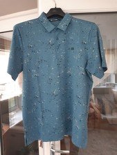 Travis Mathews Golf Polo Shirt Medium Brand New With Tags..Stellar Blue RRP £75