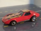 1975 Hot Wheels Corvette Stingray w/ “Ribbon Design” and Red Line Tires w/case