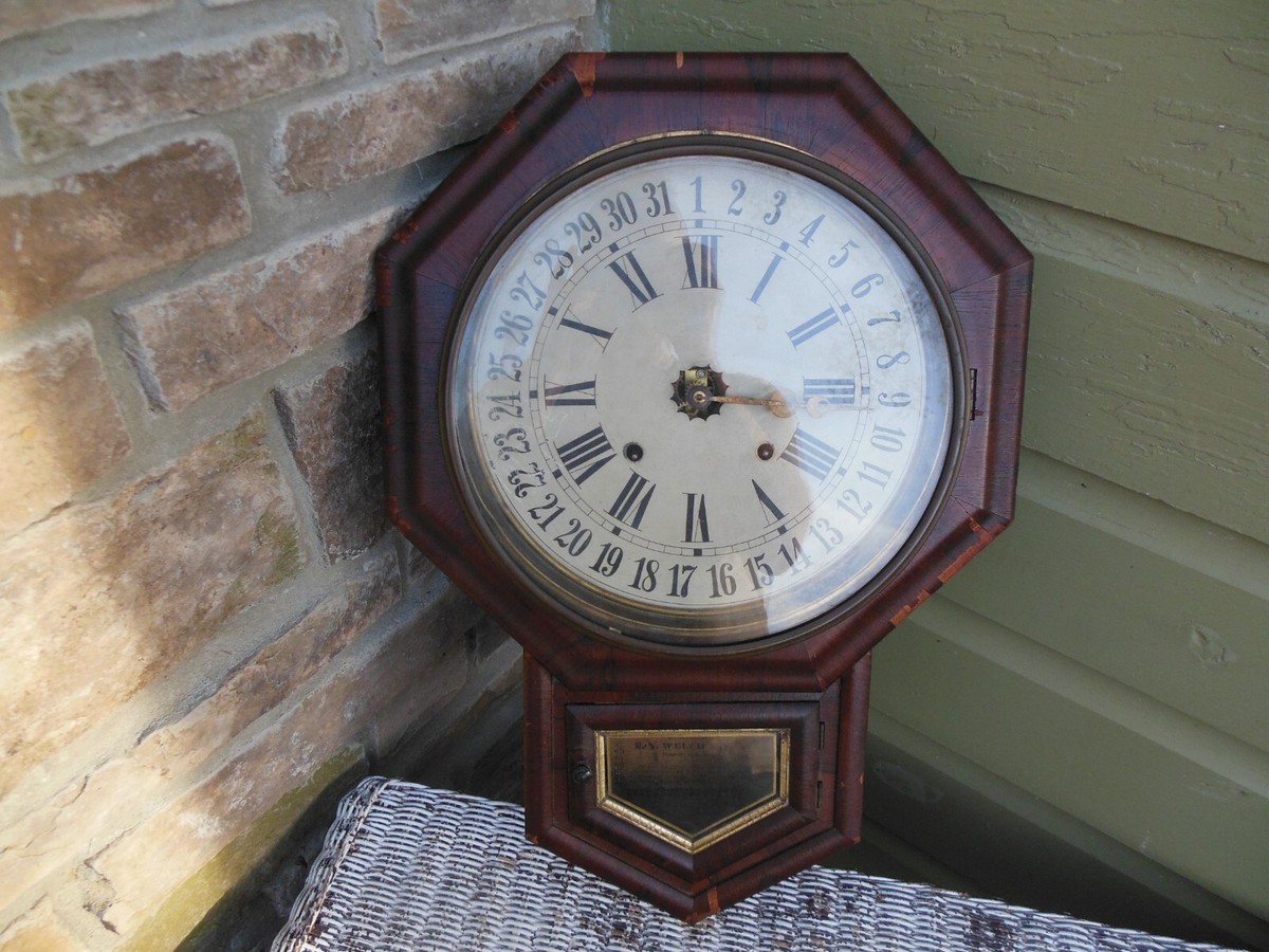Antique 8 Day Calendar Clock E N Welch Lower Cabinet Display