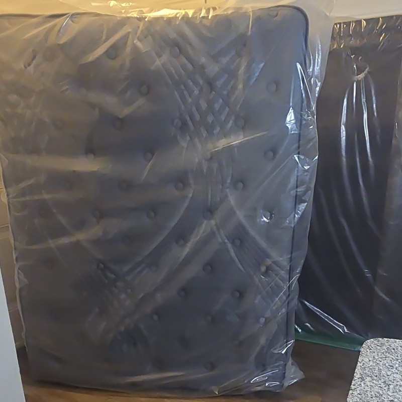 Spring Air queens mattress new in plastic.  top mattress and the box spring 
