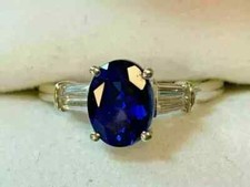 2Ct Oval Cut Lab-Created Blue Sapphire Engagement Ring In 14K White Gold Plated
