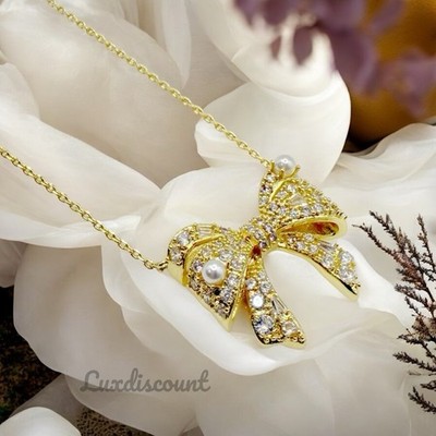 Kendra Scott Gold Krista Bow Short Pendant Necklace in White Mix