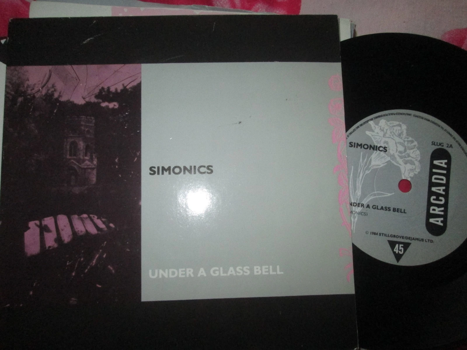 Simonics ‎– Under A Glass Bell Arcadia Records SLUG 2 UK 7inch Vinyl Single