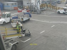 Photo 12x8 Loading the baggage at Edinburgh Airport In this case a mobilit c2017