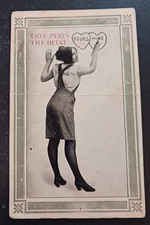 1912 postcard Love Plays The Deuce Young Woman Drawing 2 Hearts series 35 posted