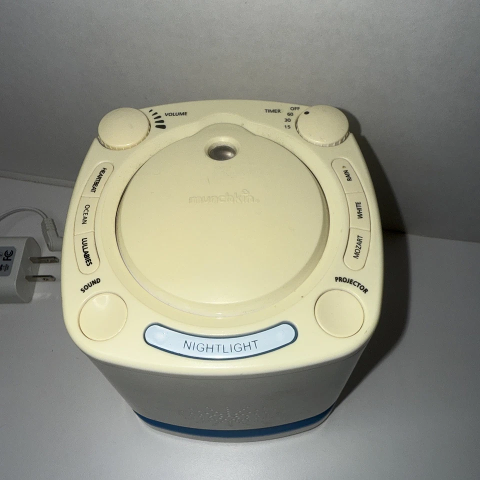 Proyector y máquina de sonido Munchkin Baby Nursery MK0038 y 3 discos de luz amarillentos Foto 4 de 4