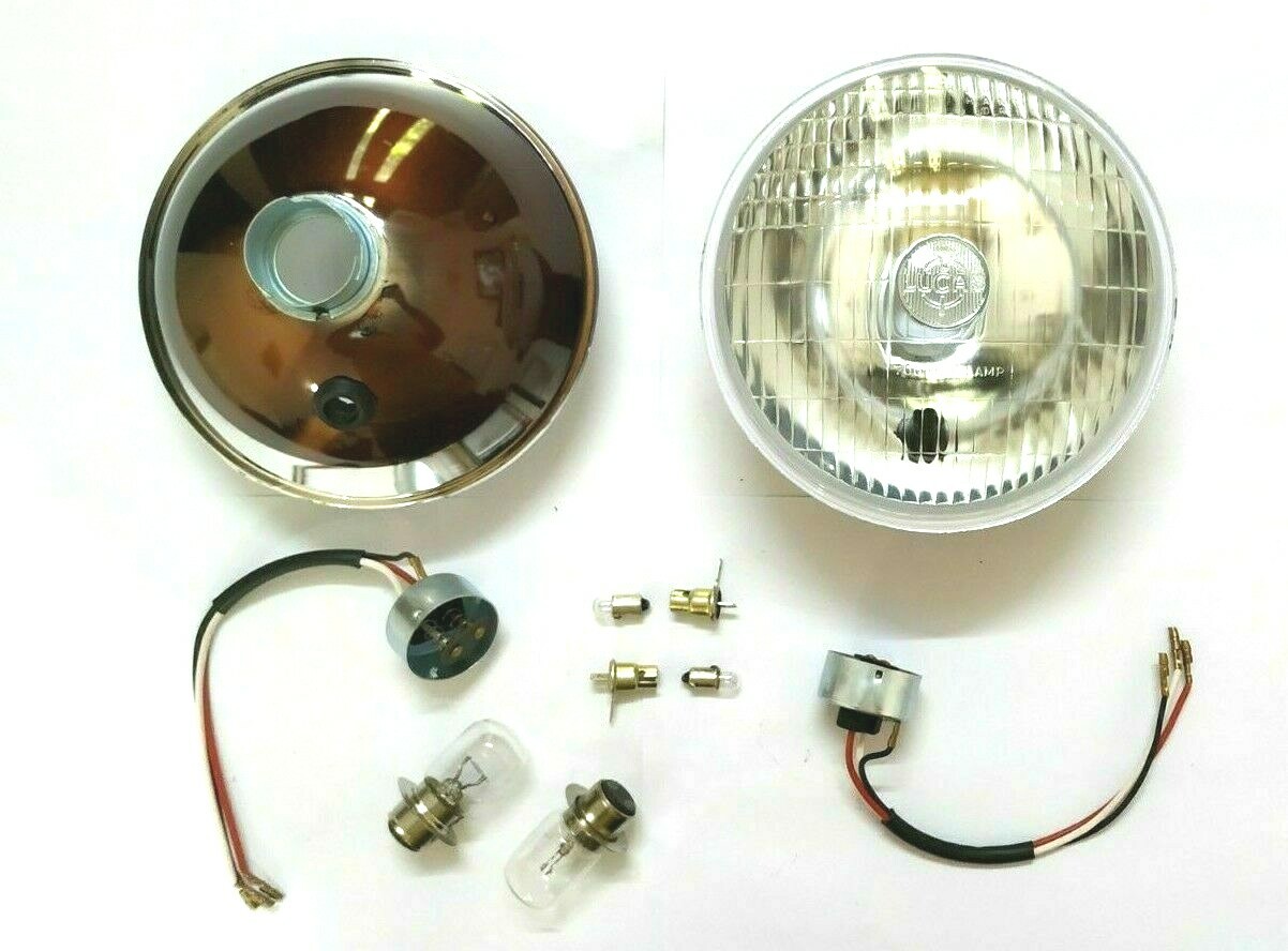 2 700 7" REPRO' HEADLIGHT + PILOT LIGHT. "LUCAS" MARKED LENS. HOLDERS