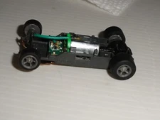 AFX MEGA G+ HO SLOT 1.7 Long NARROW CHASSIS GRAY 5 SPOKE RIMS AND TIRES