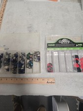 lot of various finger picks, guitar picks, va...