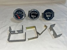 3 - Vintage Oil Pressure Gauges And 5 Extra Misc. Gauge Brackets