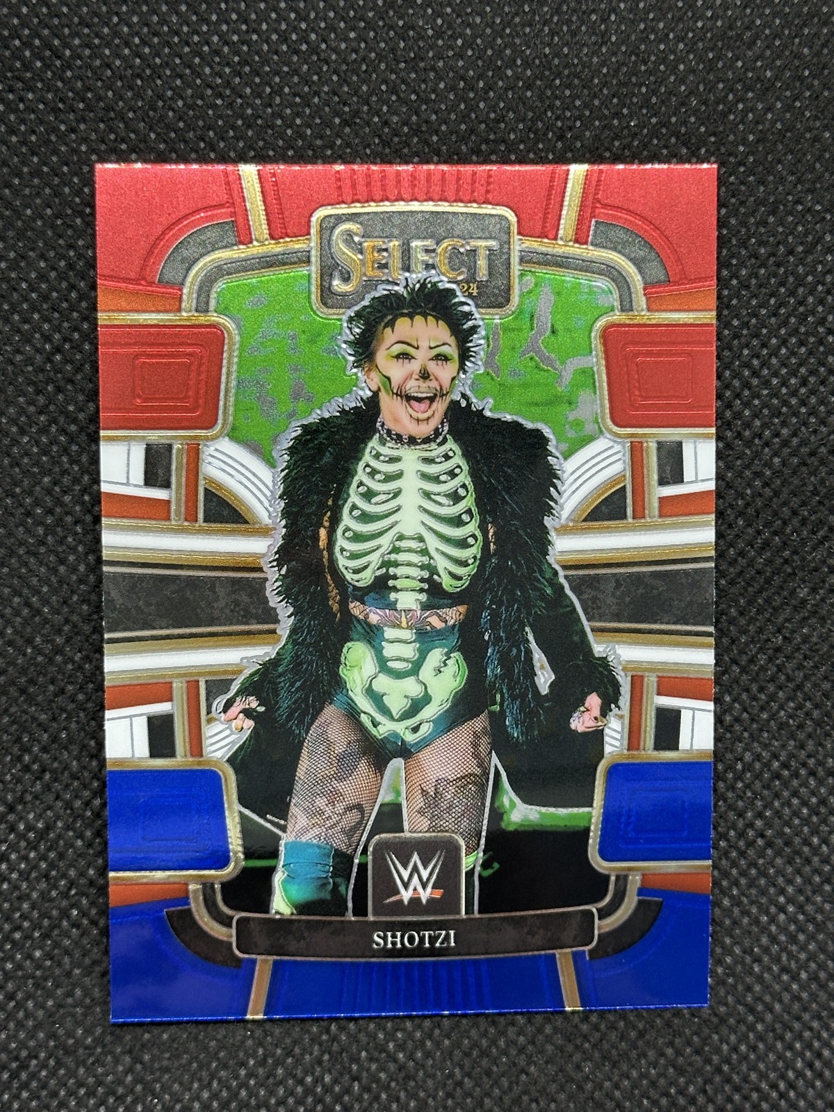 2024 Panini Select WWE - Red and Blue Shotzi #96