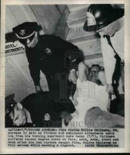 1950 Press Photo Billie Childers Carried From Burning Apartment