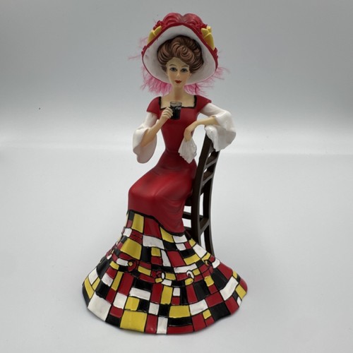 Coca-Cola Timeless Refreshment Completely Cool Figurine Red Dress Yellow Bow