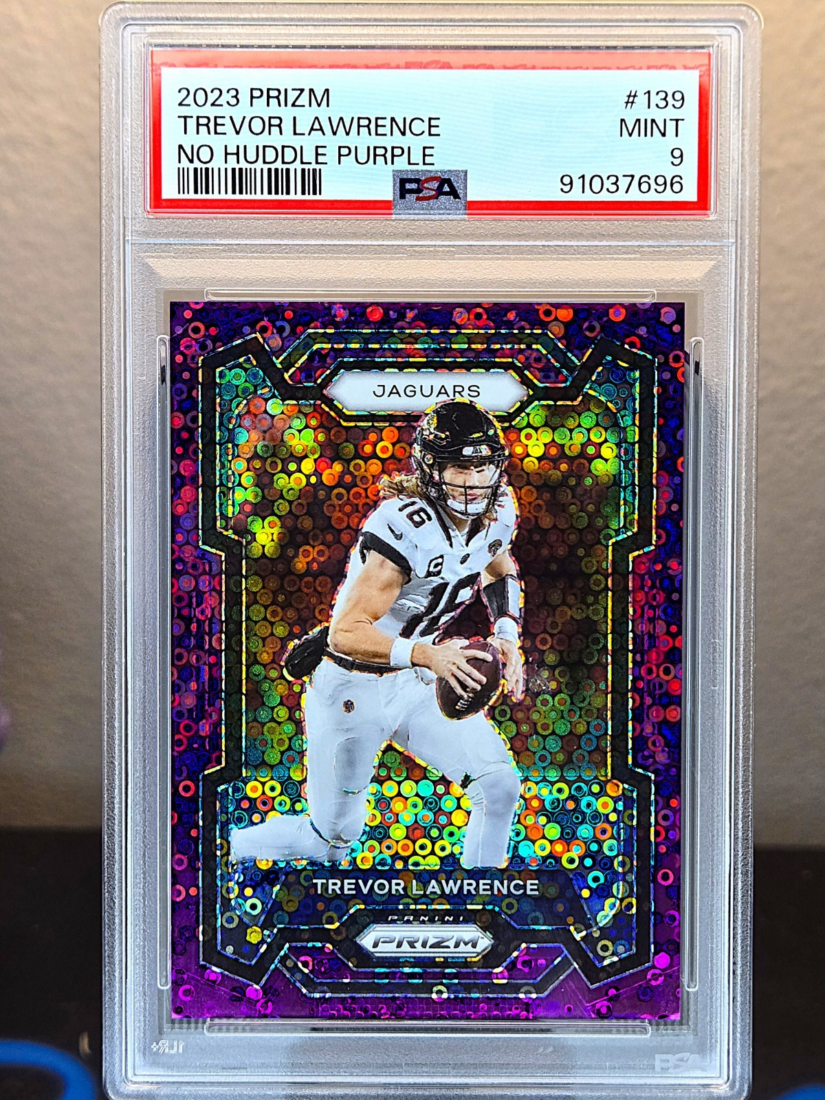 2023 Panini Prizm Purple No Huddle Prizm /35 Trevor Lawrence #139 PSA 9