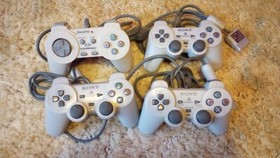 PlayStation 1 console with games