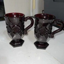 Set of 2 Avon 1876 Cape Cod Collection Ruby Red Glass Pedestal Mugs Cups