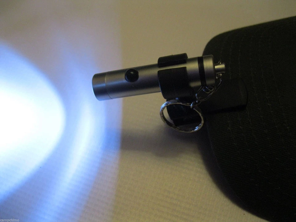 HERRAMIENTAS DE PESCA BERKLEY CLIP-ON LUZ PIVOTANTE LED MANOS LIBRES DISEÑO ANILLO BATT INC Foto 2 de 4