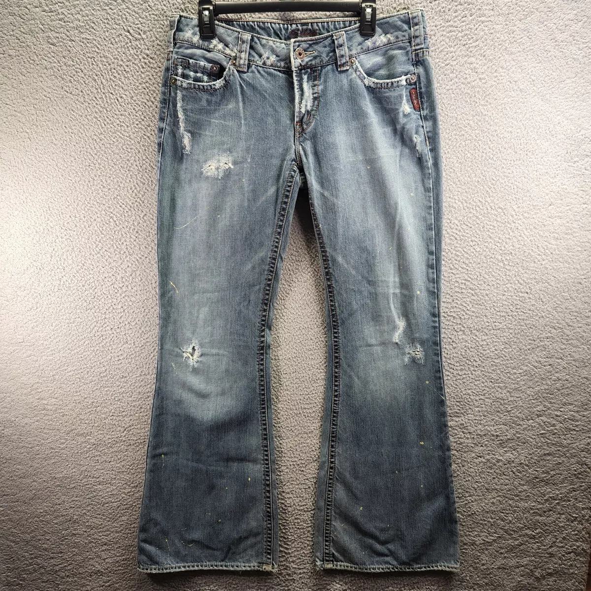 Distressed silver store jeans