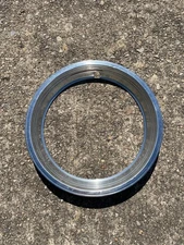 One factory 1986 to 1995 Ford Bronco 15 inch red line trim ring beauty ring