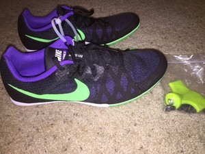 nike racing multi use spikes