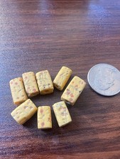 Antique Yellowish Decorated In Red Stone Beads 1/2” By 1/4 “ In Size