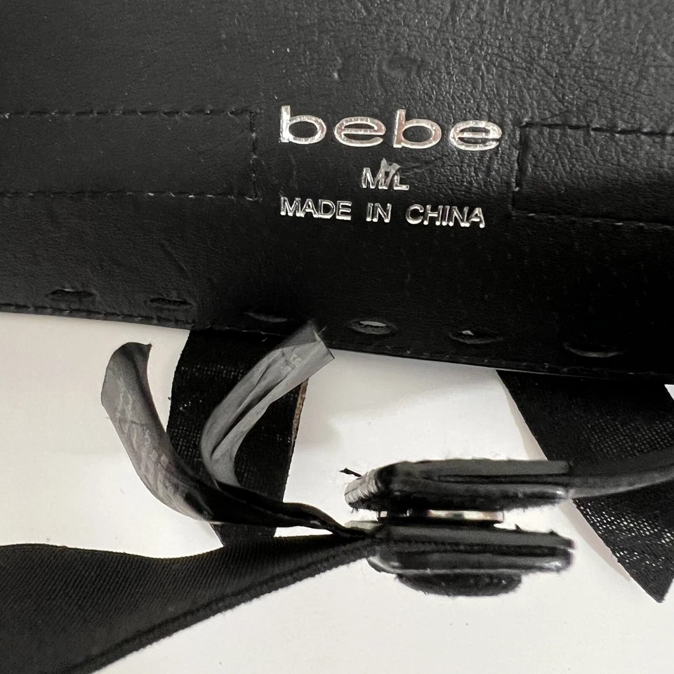 Cinturón elástico Bebe negro con lazo grande ancho brillante talla M/L Foto 4 de 4