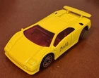 Hot Wheels Vintage Yellow 1990 Lamborghini Diablo Red Tint 1/64 Scale Loose Car.