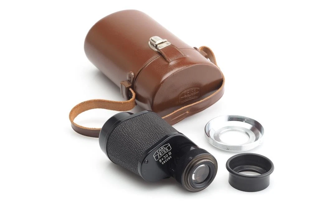 A Carl Zeiss 'Turmon' 8X monocular, with leather case and miscellaneous