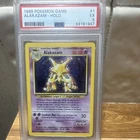 Wizards of the Coast 1999 Pokemon Base Set Alakazam Holo 1/102 PSA 5