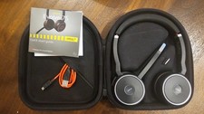 Jabra Evolve 75 UC Professional Wireless Headset with superior ANC and charger.