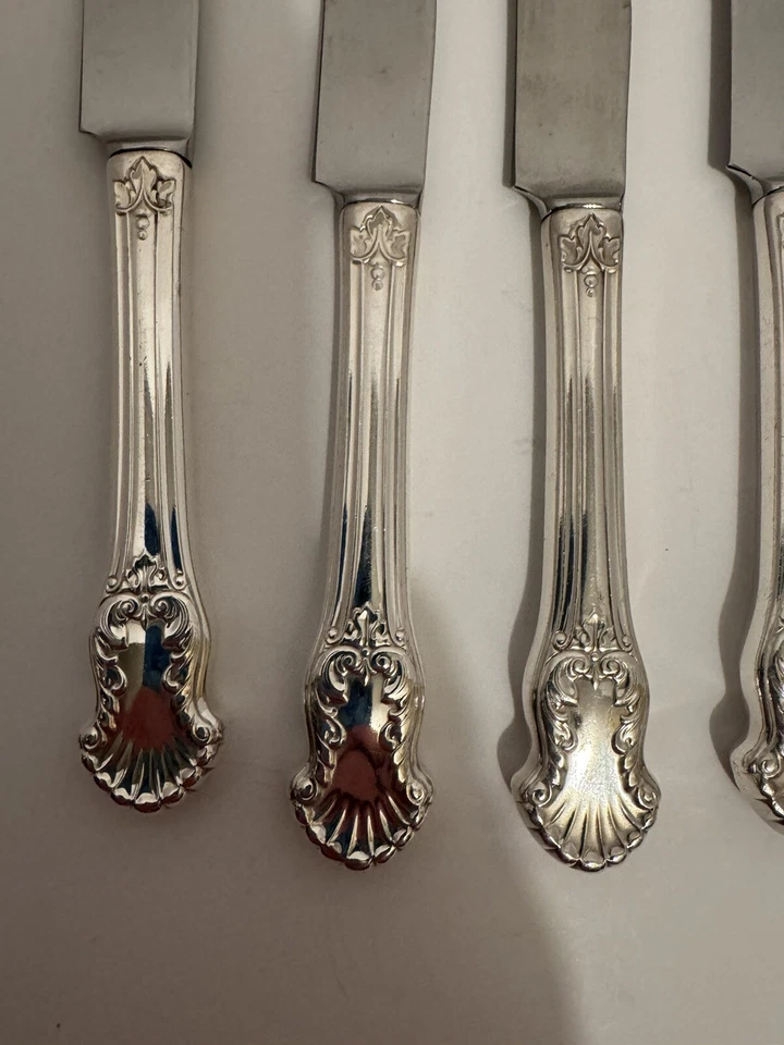 "Juego de 8 cuchillos de mantequilla de 9,5"" con patrón de concierto de National Guildcraft de colección 1944"  Foto 2 de 4