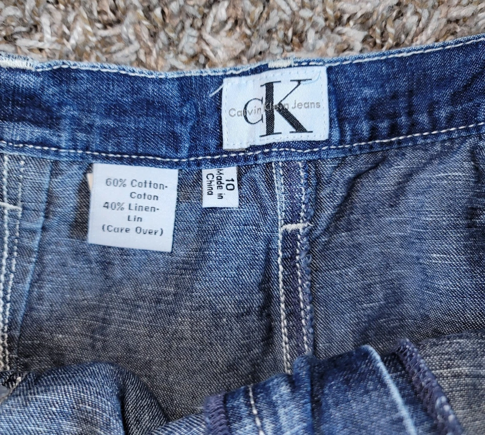 Falda vintage para mujer Calvin Klein 10 bolsillos de algodón lavado oscuro de mezclilla azul Foto 3 de 4