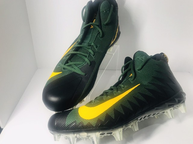 green and yellow football cleats