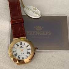 Pryngeps Caprice Swiss quartz cassa placcata oro 37mm roman dial card tag NUOVO